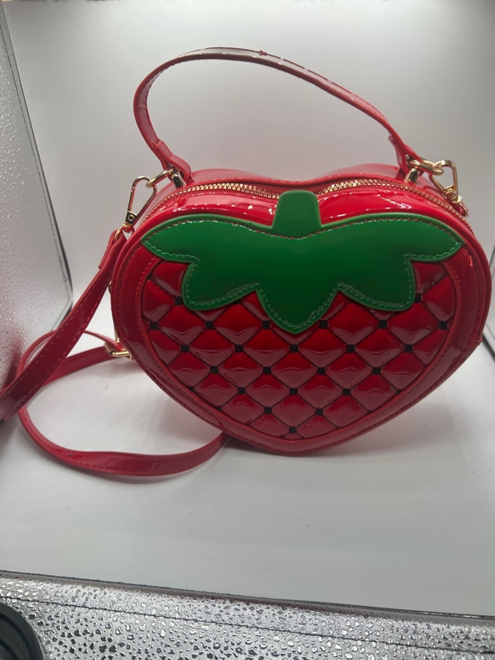 Love Notes Red Patent Strawberry Heart Crossbody with Green Leaf Accent